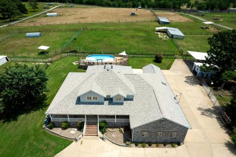 birds eye view of a big light grey building